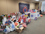 A pile of toys received in the toy drive.