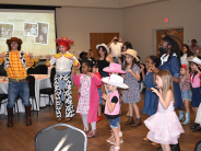 Daddy Daughter Dance Western theme girls dancing with the special characters