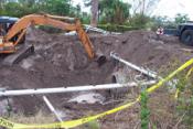 backhoe digging a hole